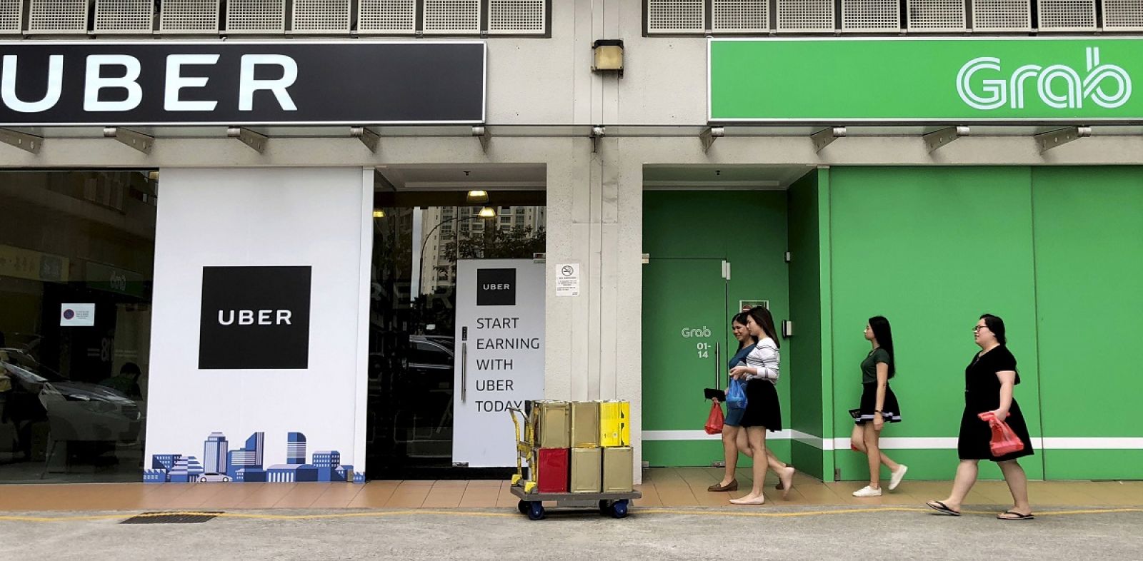 Singapore "xử" Grab và Uber sau thương vụ sáp nhập